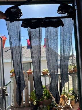 2 pair ultra sheer large black thigh high stockings. New. Never worn